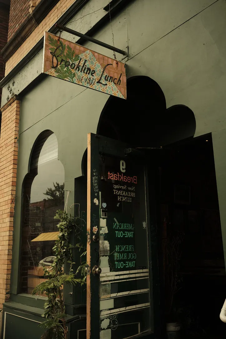The hand-painted Brookline Lunch sign above the door